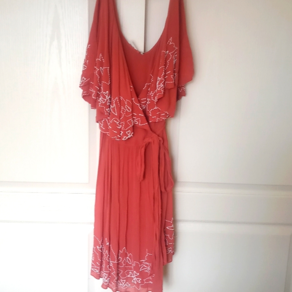 Free People brand new dress wrap size large pumpkin colored with white